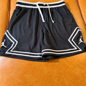 Jordan Nike Black Shorts with Red Jumpman and White Waistband